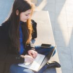 Young woman smart working using computer