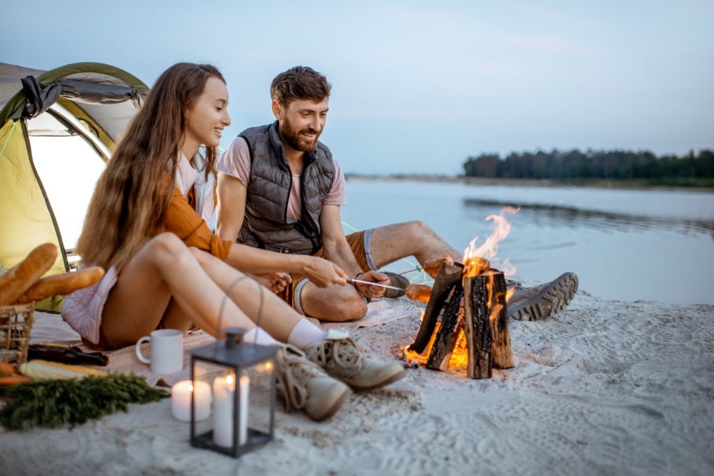 Couple at the campsite on the beach