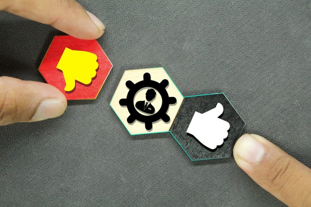 hexagon with like and dislike icons. Thumbs up and thumbs down icons. Reviewed